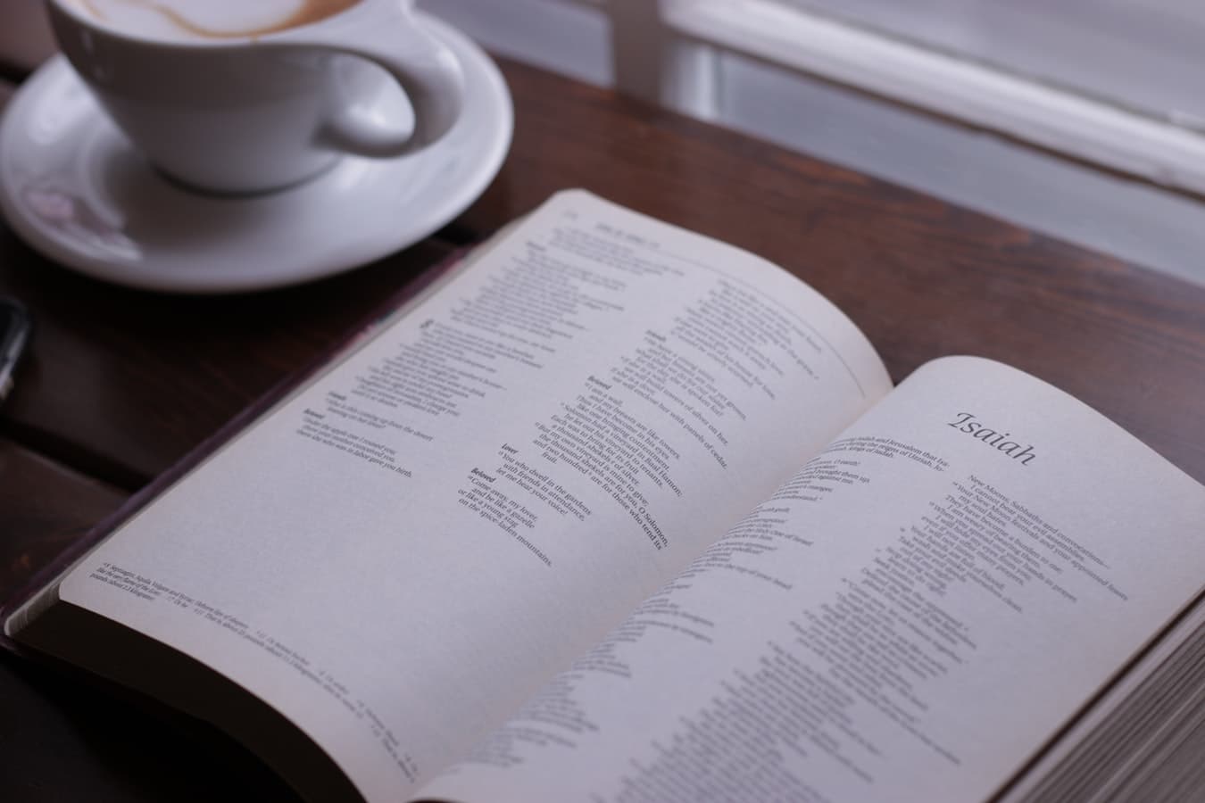 Bible with cup of coffee